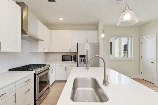Interior, Kitchen, Pendant Lights, Recessed Lighting, Stainless Steel Appliances, Wood Texture Flooring