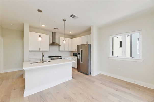 Interior, Kitchen, Pendant Lights, Recessed Lighting, Stainless Steel Appliances, Wood Texture Flooring