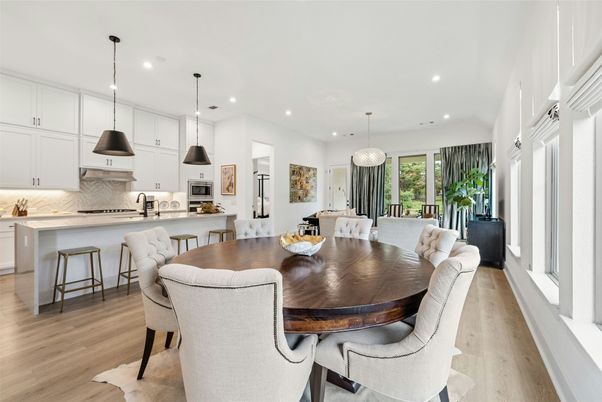Dining room, Interior, Kitchen, Pendant Lights, Recessed Lighting, Stainless Steel Appliances, Wood Texture Flooring