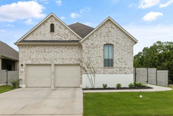 Attached, Exterior, Facade, Brick Facade, Brick Traditional