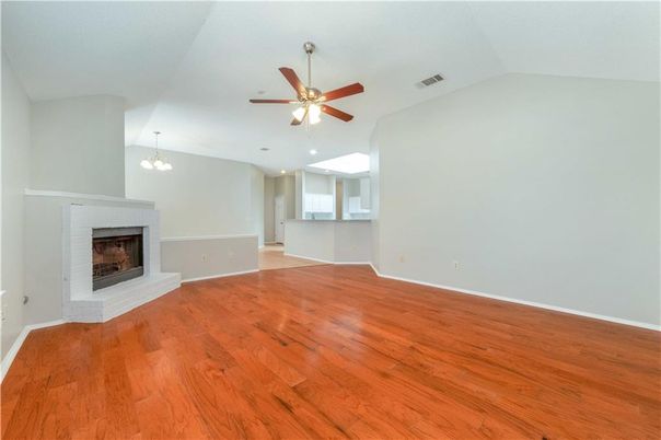 Chandelier, Empty room, Fireplace, Interior, Recessed Lighting, Wood Texture Flooring