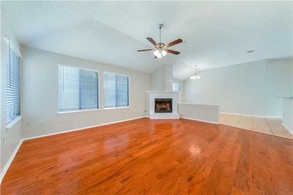 Empty room, Fireplace, Interior, Pendant Lights, Wood Texture Flooring