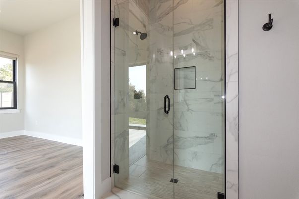 Bathroom, Glass Shower, Interior, Marble Walls, Wood Texture Flooring