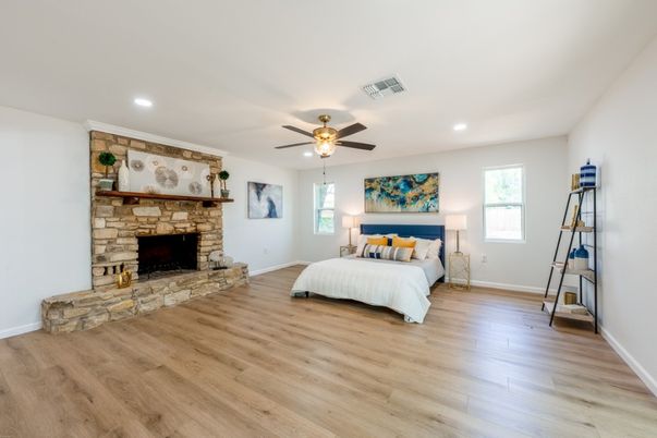 Bedroom, Fireplace, Interior, Recessed Lighting, Wood Texture Flooring
