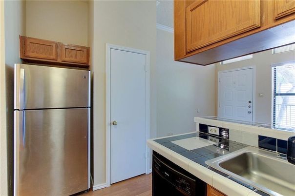 Interior, Kitchen, Tile Countertops, Wood Texture Flooring