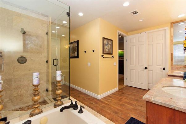 Bathroom, Dual Sink Vanities, Glass Shower, Interior, Recessed Lighting, Wood Texture Flooring