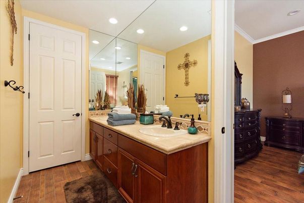Bathroom, Dual Sink Vanities, Interior, Recessed Lighting, Wood Texture Flooring