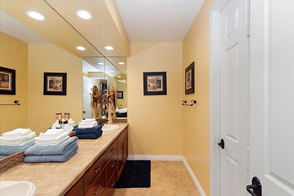 Bathroom, Dual Sink Vanities, Interior, Recessed Lighting, Tile Countertops