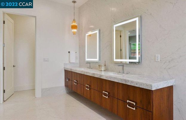 Bathroom, Dual Sink Vanities, Interior, Marble, Marble Walls, Pendant Lights