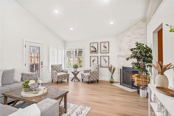 Fireplace, Interior, Living room, Recessed Lighting, Stone Walls, Wood Texture Flooring