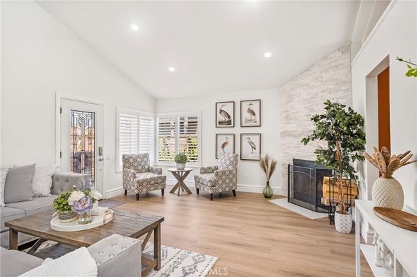 Fireplace, Interior, Living room, Recessed Lighting, Stone Walls, Wood Texture Flooring