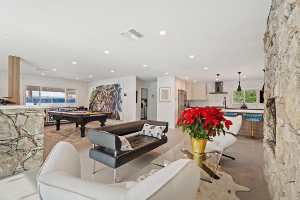 Billiard Table, Game Room, Interior, Kitchen, Living room, Pendant Lights, Recessed Lighting, Stainless Steel Appliances, Stone Walls