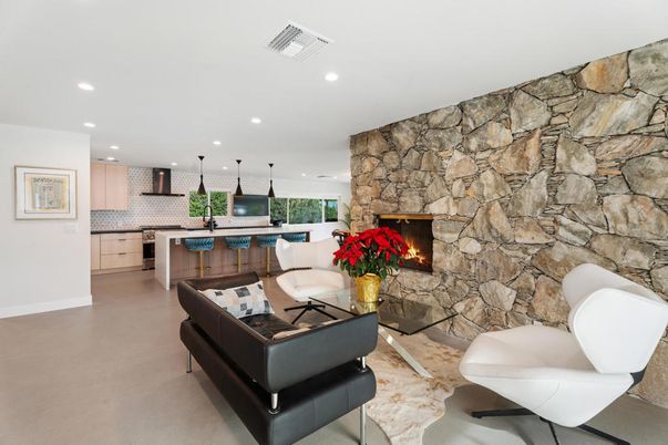 Fireplace, Interior, Kitchen, Living room, Pendant Lights, Recessed Lighting, Stainless Steel Appliances, Stone Walls
