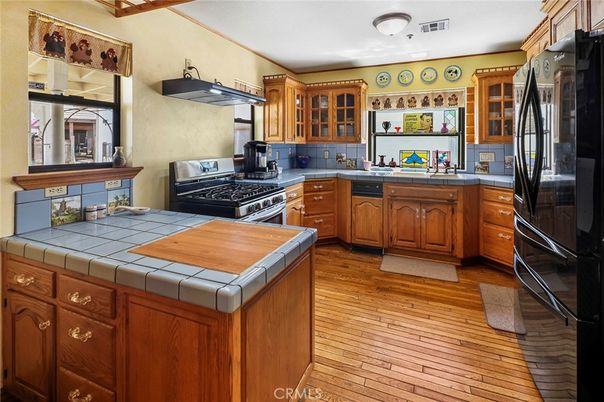 Interior, Kitchen, Tile Countertops, Wood Texture Flooring