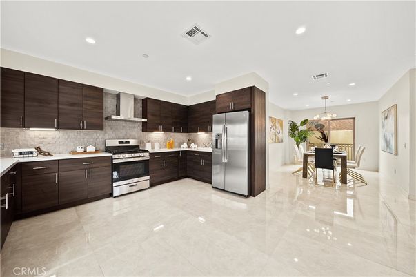 Chandelier, Dining room, Interior, Kitchen, Pendant Lights, Recessed Lighting, Stainless Steel Appliances