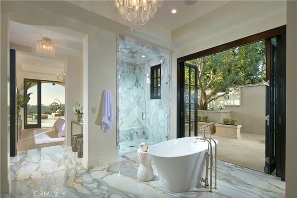 Bathroom, Chandelier, Free Standing Baths, Glass Shower, Interior, Marble, Marble Walls, Recessed Lighting