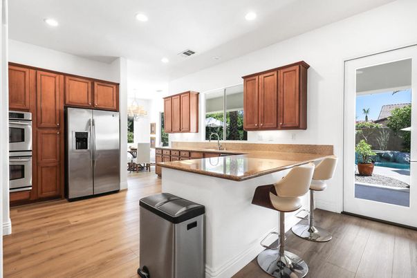 Chandelier, Dining room, Interior, Kitchen, Recessed Lighting, Stainless Steel Appliances, Wood Texture Flooring