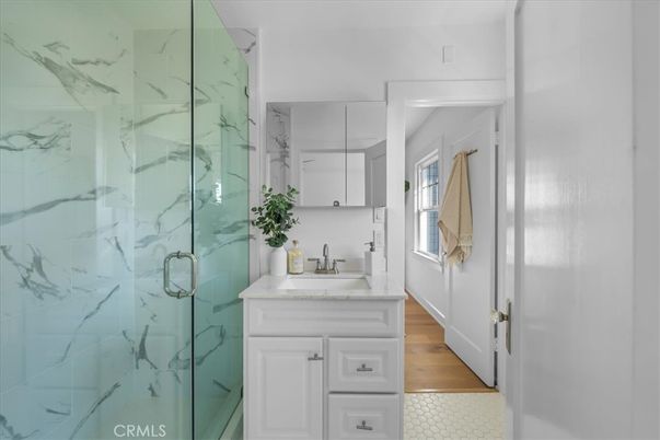 Bathroom, Glass Shower, Interior, Marble Walls, Wood Texture Flooring