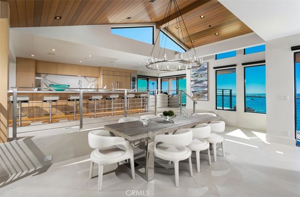 Dining room, Interior, Kitchen, Pendant Lights, Recessed Lighting, Stainless Steel Appliances, Water, Wooden Ceilings