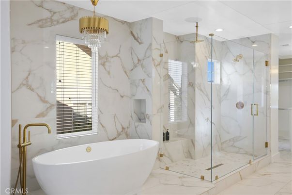 Bathroom, Free Standing Baths, Glass Shower, Interior, Marble, Marble Walls, Pendant Lights, Recessed Lighting