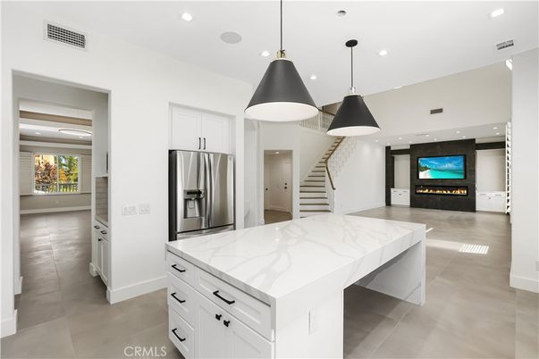 Fireplace, Interior, Kitchen, Pendant Lights, Recessed Lighting, Stainless Steel Appliances