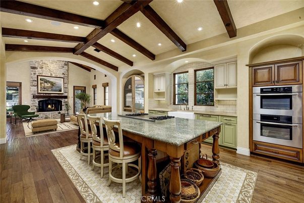 Fireplace, Interior, Kitchen, Living room, Recessed Lighting, Stainless Steel Appliances, Stone Walls, Wooden Beams, Wood Texture Flooring