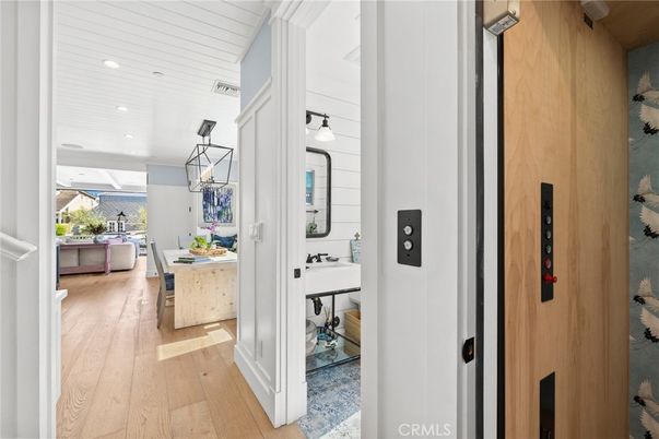 Elevator, Interior, Pendant Lights, Recessed Lighting, Wood Texture Flooring