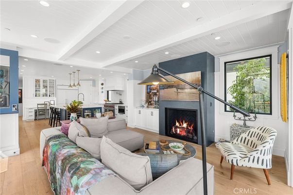 Dining room, Fireplace, Interior, Kitchen, Living room, Pendant Lights, Recessed Lighting, Stainless Steel Appliances, Wood Texture Flooring