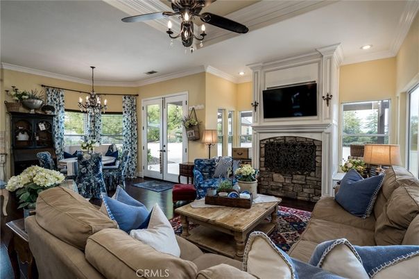 Chandelier, Dining room, Fireplace, Interior, Living room, Recessed Lighting, Wood Texture Flooring