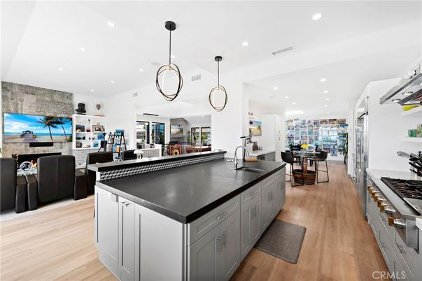 Dining room, Interior, Kitchen, Living room, Pendant Lights, Recessed Lighting, Stainless Steel Appliances, Wood Texture Flooring