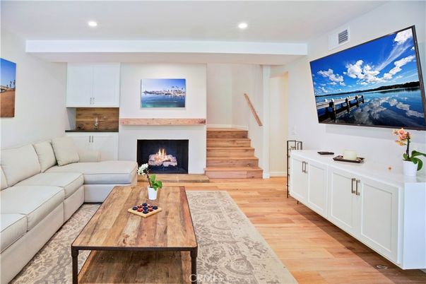 Fireplace, Interior, Living room, Recessed Lighting, Wood Texture Flooring