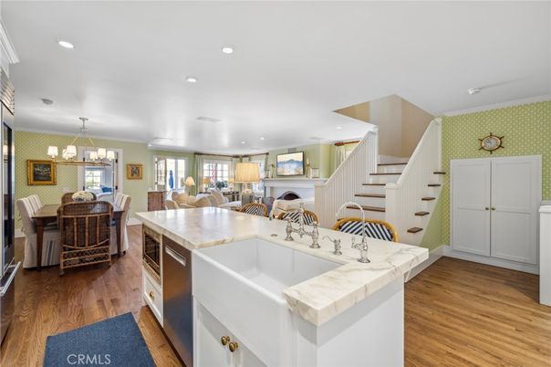 Chandelier, Dining room, Fireplace, Interior, Kitchen, Pendant Lights, Recessed Lighting, Wood Texture Flooring