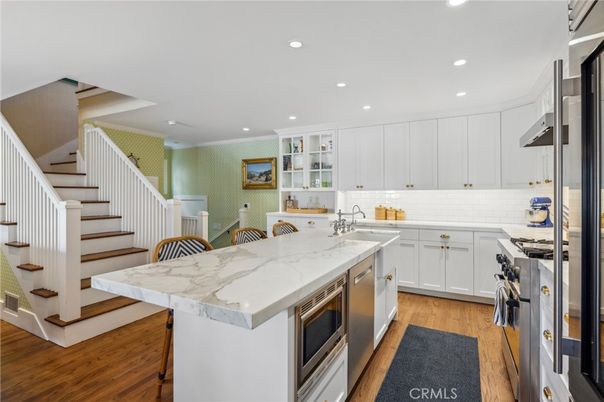Dining room, Interior, Kitchen, Recessed Lighting, Stainless Steel Appliances, Wood Texture Flooring