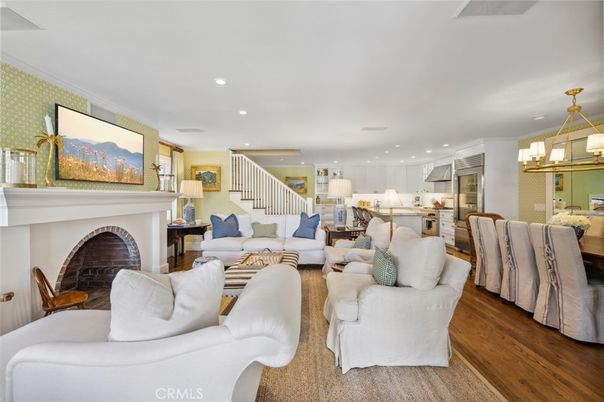 Dining room, Fireplace, Interior, Kitchen, Living room, Pendant Lights, Recessed Lighting, Stainless Steel Appliances, Wood Texture Flooring