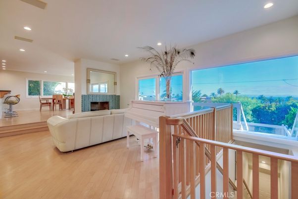 Fireplace, Interior, Living room, Piano, Recessed Lighting, Wood Texture Flooring