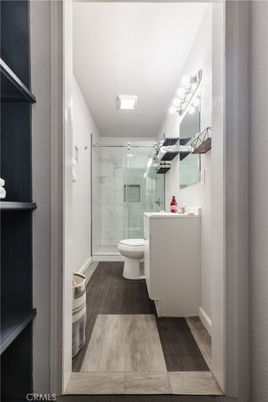 Bathroom, Glass Shower, Interior, Marble Walls, Wood Texture Flooring