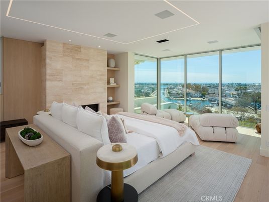 Bedroom, Fireplace, Interior, Recessed Lighting, Water, Wood Texture Flooring