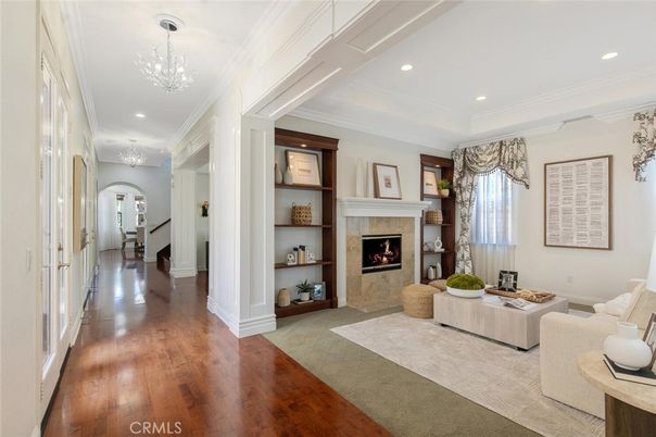 Chandelier, Fireplace, Interior, Living room, Recessed Lighting, Wood Texture Flooring