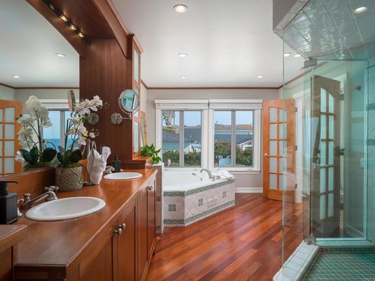 Bathroom, Dual Sink Vanities, Glass Shower, Interior, Recessed Lighting, Wood Texture Flooring