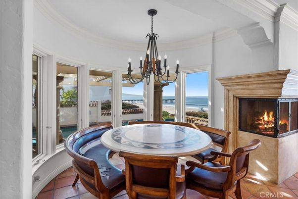 Chandelier, Dining room, Fireplace, Interior, Water