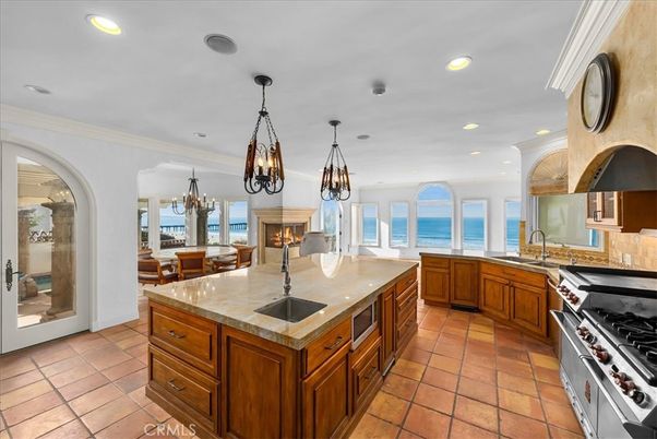 Chandelier, Dining room, Fireplace, Interior, Kitchen, Pendant Lights, Recessed Lighting, Stainless Steel Appliances, Water