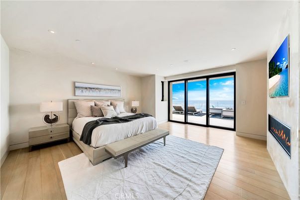 Bedroom, Fireplace, Interior, Recessed Lighting, Water, Wood Texture Flooring