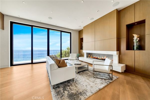 Fireplace, Interior, Living room, Recessed Lighting, Water, Wood Texture Flooring, Wooden Walls