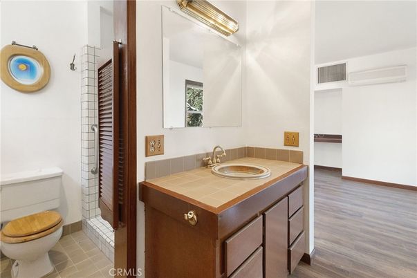Bathroom, Interior, Tile Countertops, Wood Texture Flooring