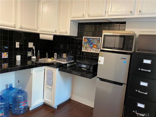 Interior, Kitchen, Tile Countertops, Wood Texture Flooring