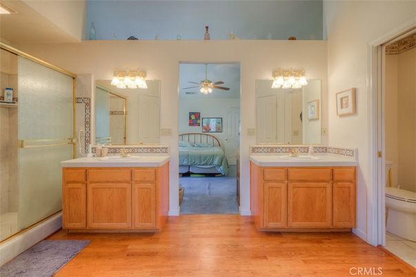 Bathroom, Bedroom, Dual Sink Vanities, Glass Shower, Interior, Wood Texture Flooring