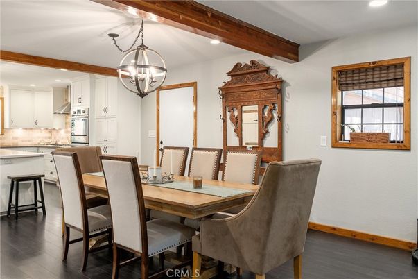 Chandelier, Dining room, Interior, Kitchen, Pendant Lights, Recessed Lighting, Wooden Beams, Wood Texture Flooring