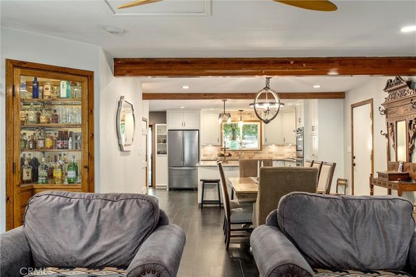 Dining room, Interior, Kitchen, Living room, Pendant Lights, Recessed Lighting, Stainless Steel Appliances, Wooden Beams, Wood Texture Flooring