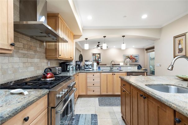 Interior, Kitchen, Pendant Lights, Recessed Lighting, Stainless Steel Appliances, Stone Walls