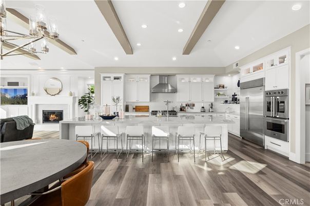 Fireplace, Interior, Kitchen, Recessed Lighting, Stainless Steel Appliances, Wooden Beams, Wood Texture Flooring